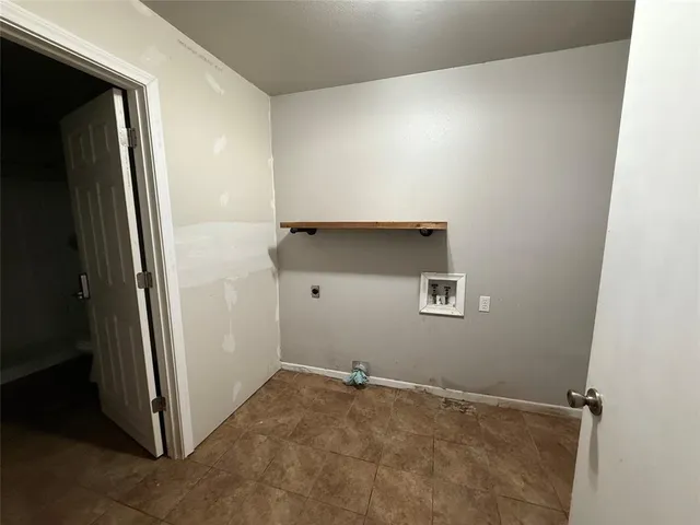 a view of a hallway with closet