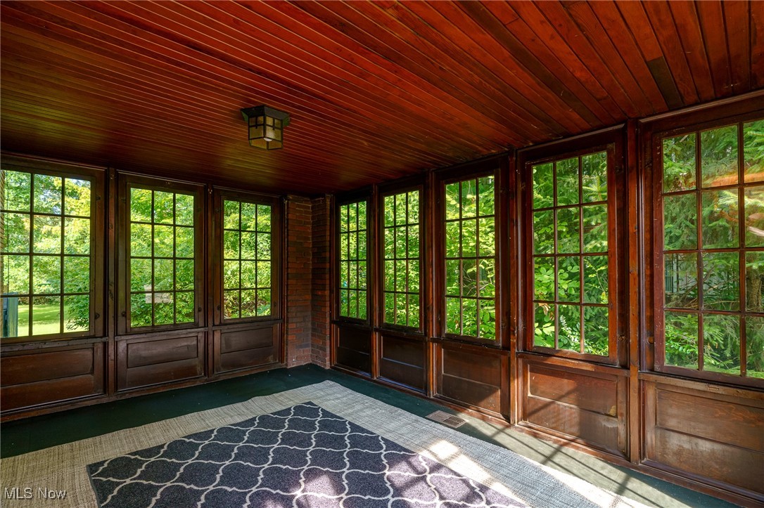 2624 Lee Road Cleveland, OH 44118 - Photo 7 of 50 Unfurnished sunroom featuring wood ceiling and plenty of natural light