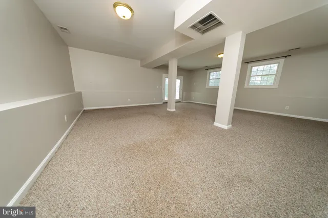 a front view of a house with swimming pool