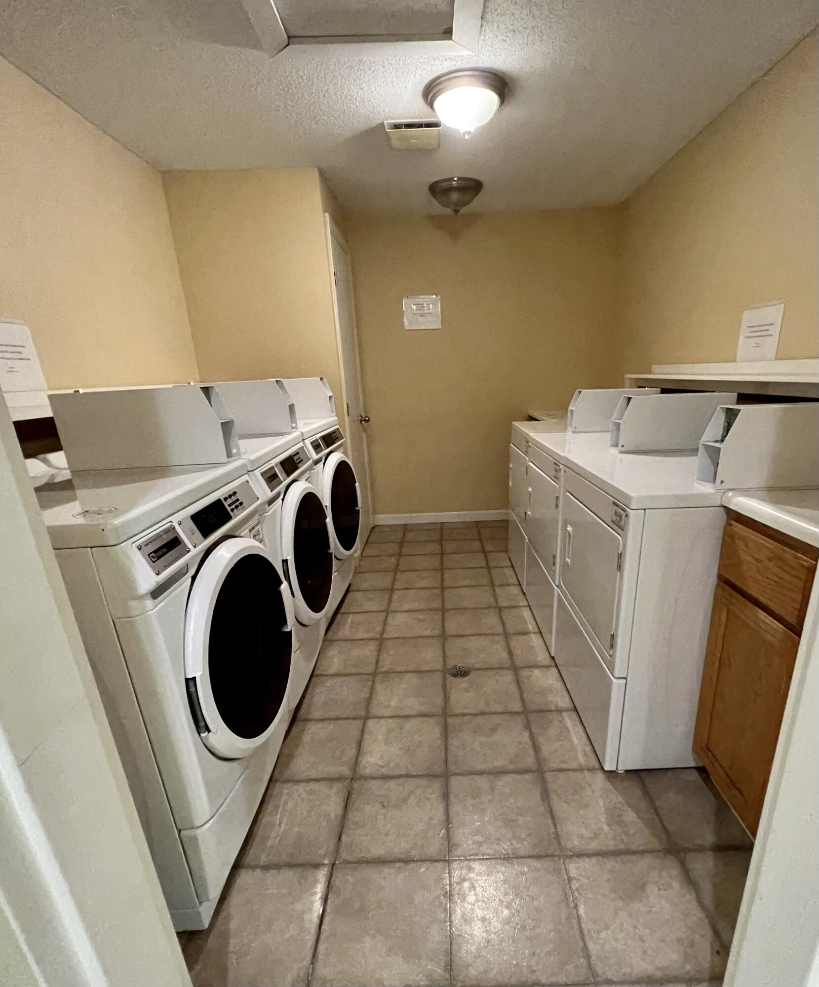 79 East Ridge Road, Unit 109 Southwest Harbor, ME 04679 - Photo 29 of 43 Common coin-op laundry