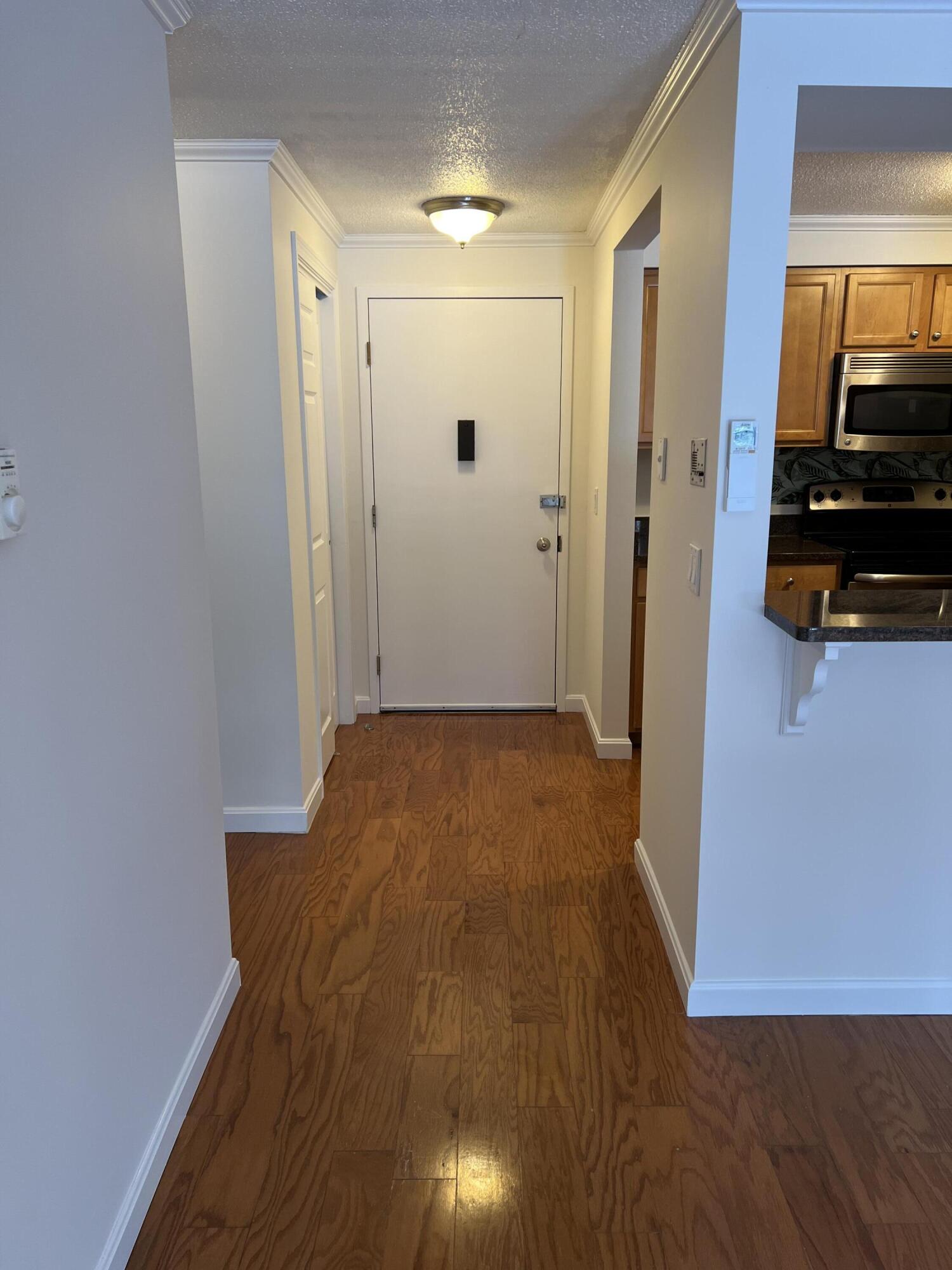 79 East Ridge Road, Unit 109 Southwest Harbor, ME 04679 - Photo 3 of 43 Hall to door