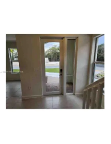 a black and white photo of a living room