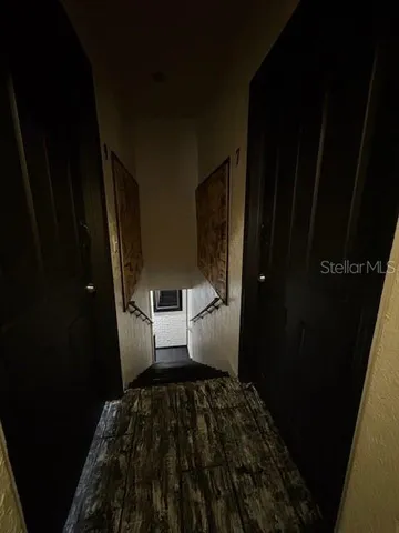 a bedroom with a bed and a bathroom