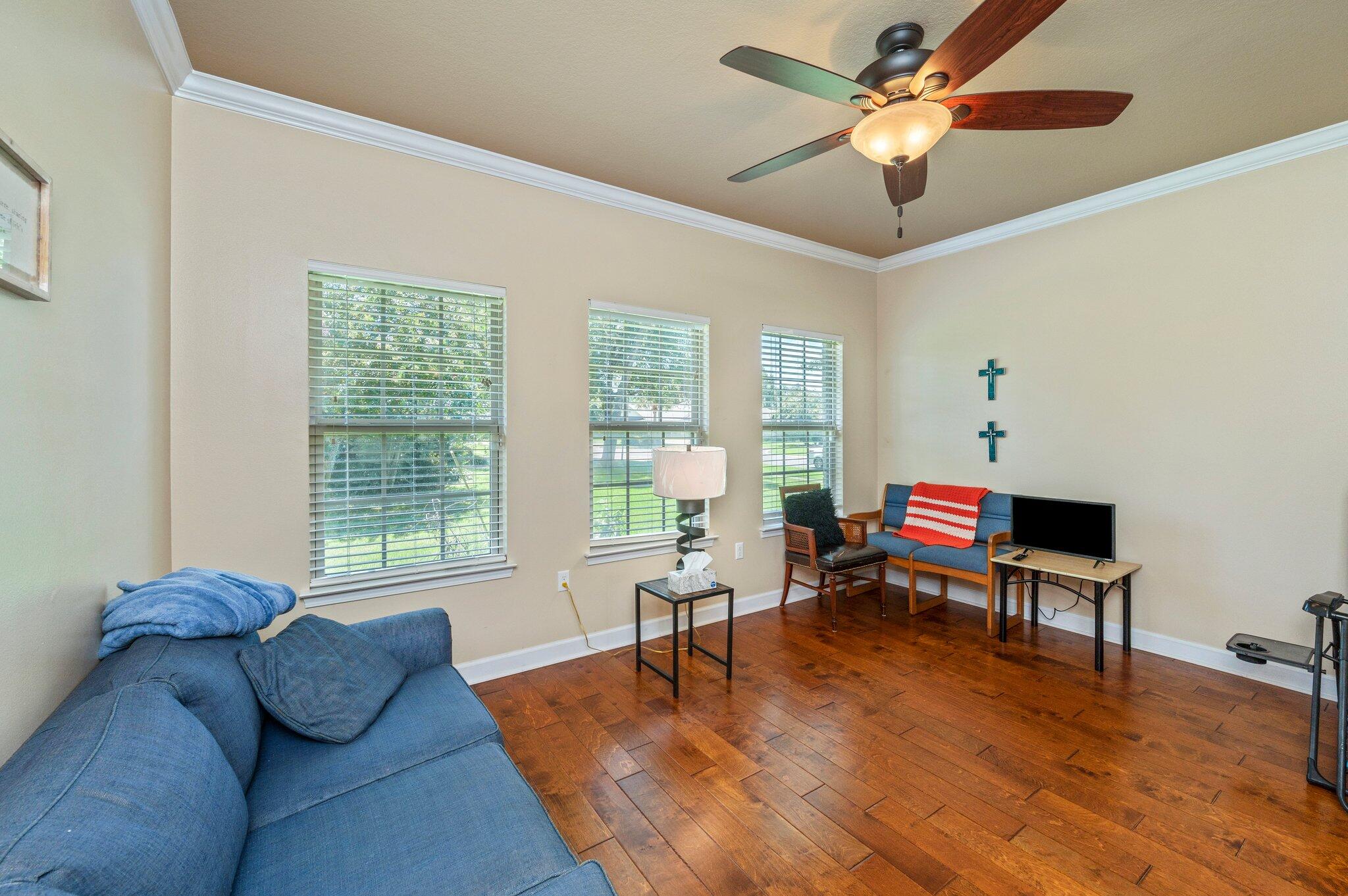 4615 Chanan Drive Crestview, FL 32539 - Photo 14 of 47 a living room with furniture and a window