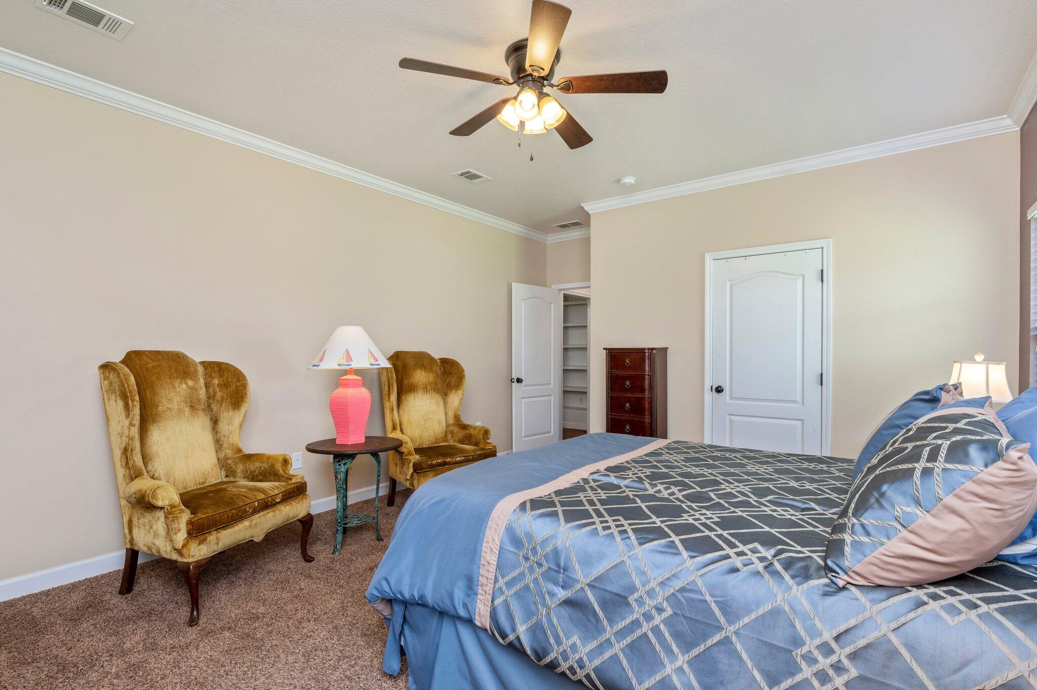 4615 Chanan Drive Crestview, FL 32539 - Photo 26 of 47 a bedroom with a bed and furniture