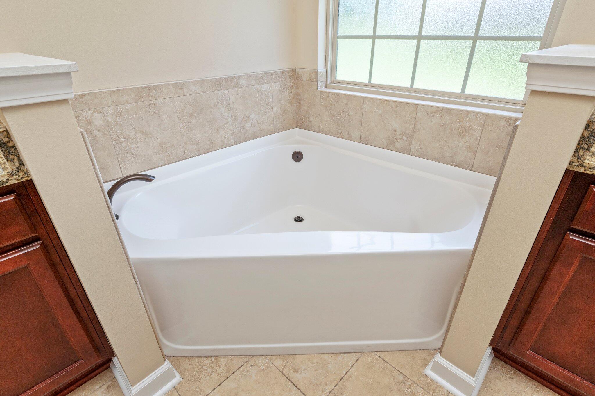 4615 Chanan Drive Crestview, FL 32539 - Photo 30 of 47 a bathroom with a bathtub