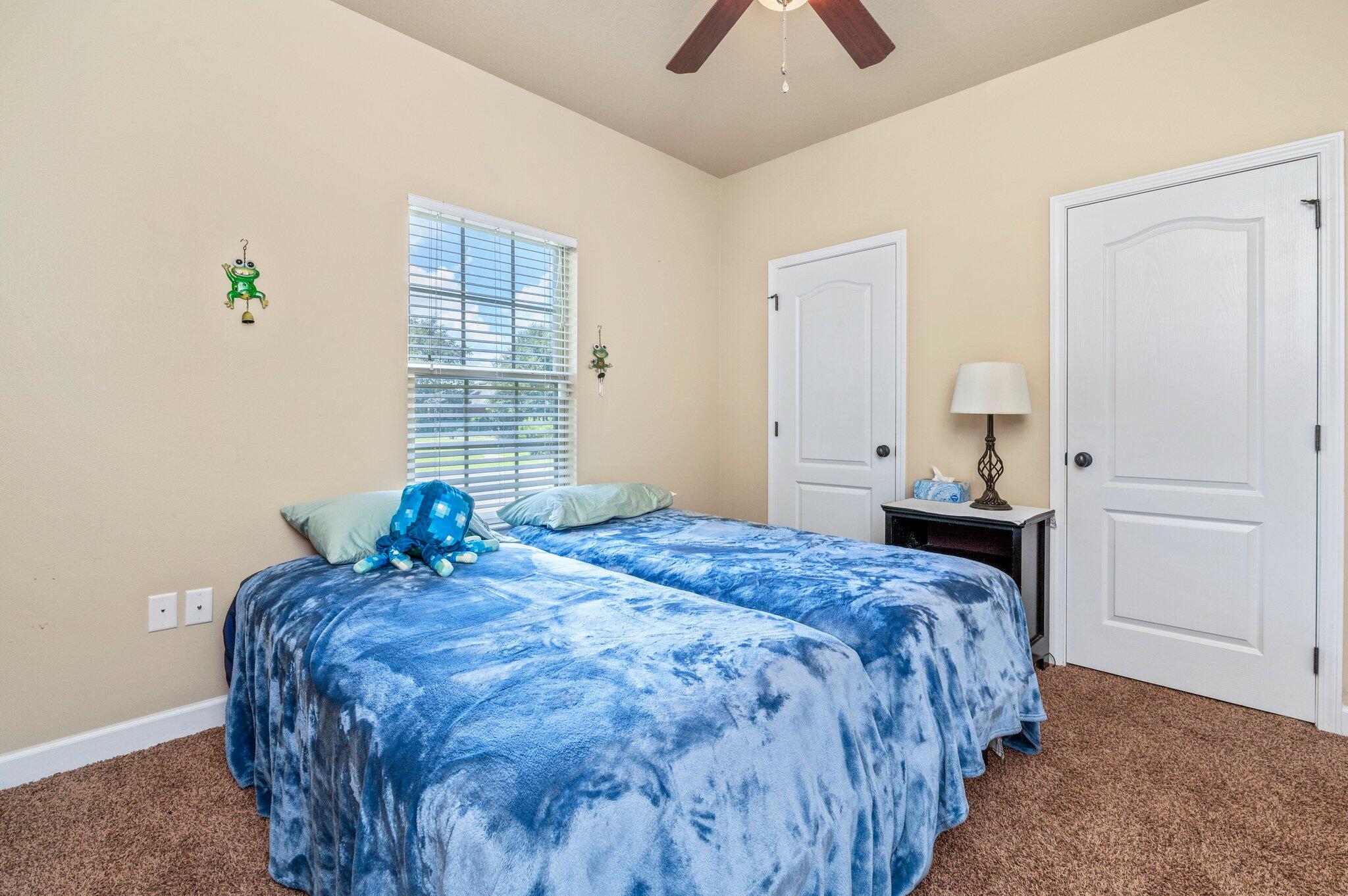 4615 Chanan Drive Crestview, FL 32539 - Photo 41 of 47 a bedroom with a bed and a window