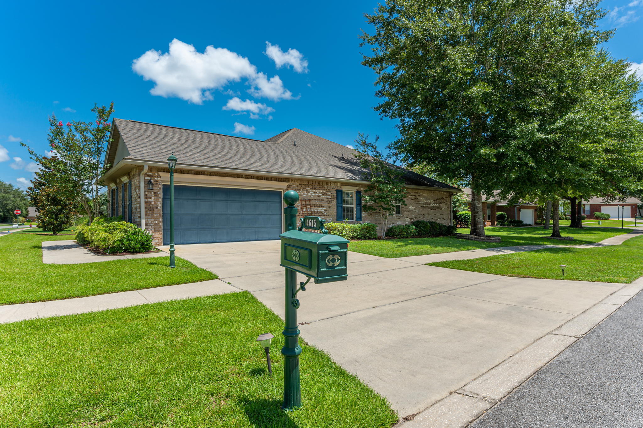 4615 Chanan Drive Crestview, FL 32539 - Photo 5 of 47 a front view of a house with yard and green space