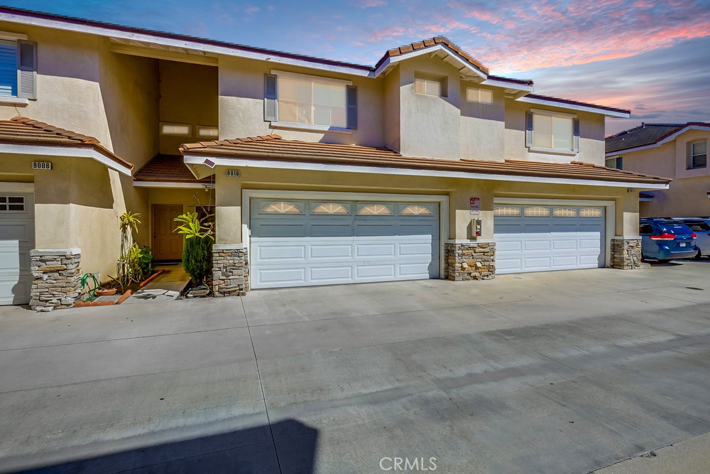 9010 Primavera Lane Cypress, CA 90630 - Photo 1 of 1 a front view of a house with a garage