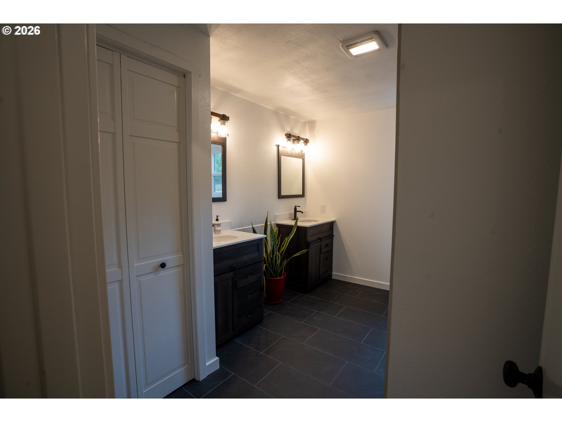 37075 Camp Creek Road Springfield, OR 97478 - Photo 19 of 48 a bathroom with a sink and a mirror