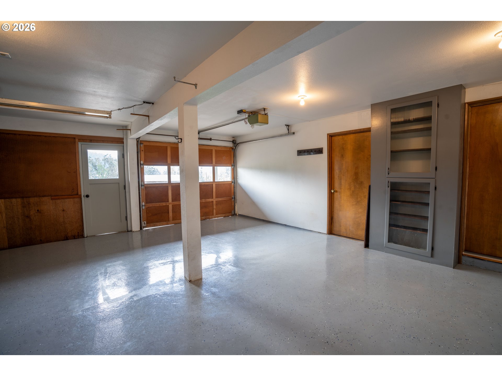 37075 Camp Creek Road Springfield, OR 97478 - Photo 39 of 48 a view of empty room with wooden floor