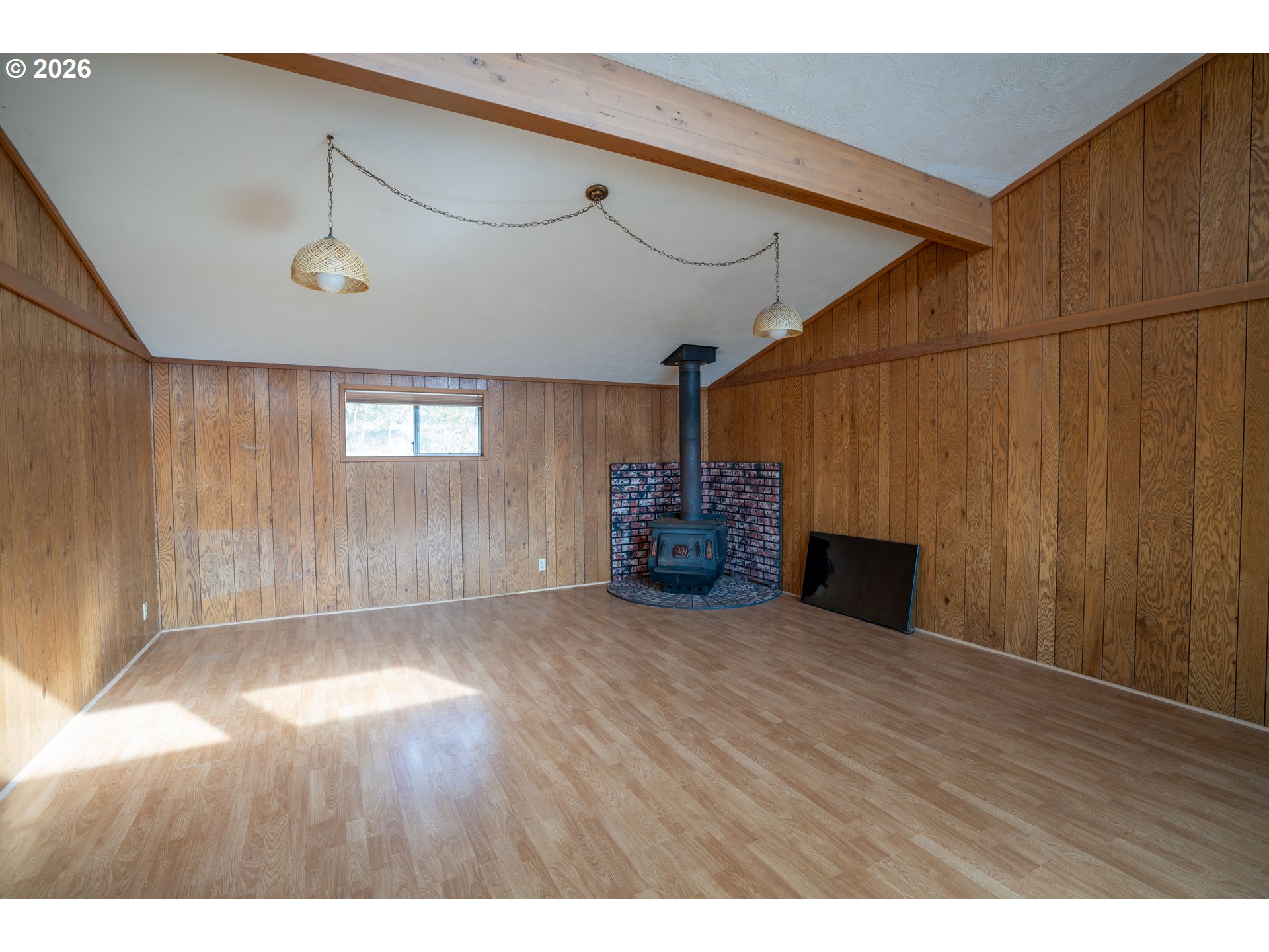 37075 Camp Creek Road Springfield, OR 97478 - Photo 41 of 48 a view of an empty room with wooden floor