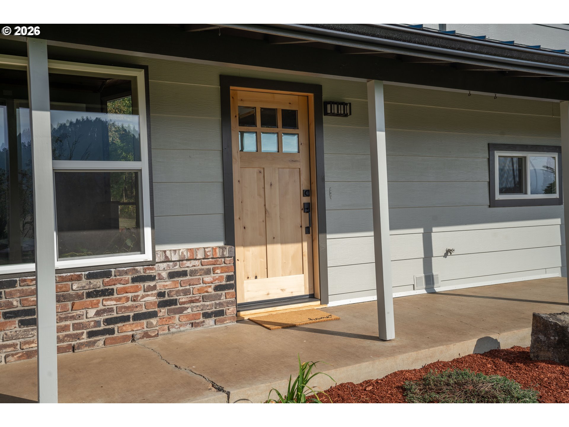 37075 Camp Creek Road Springfield, OR 97478 - Photo 5 of 48 a black and white building with a outdoor space