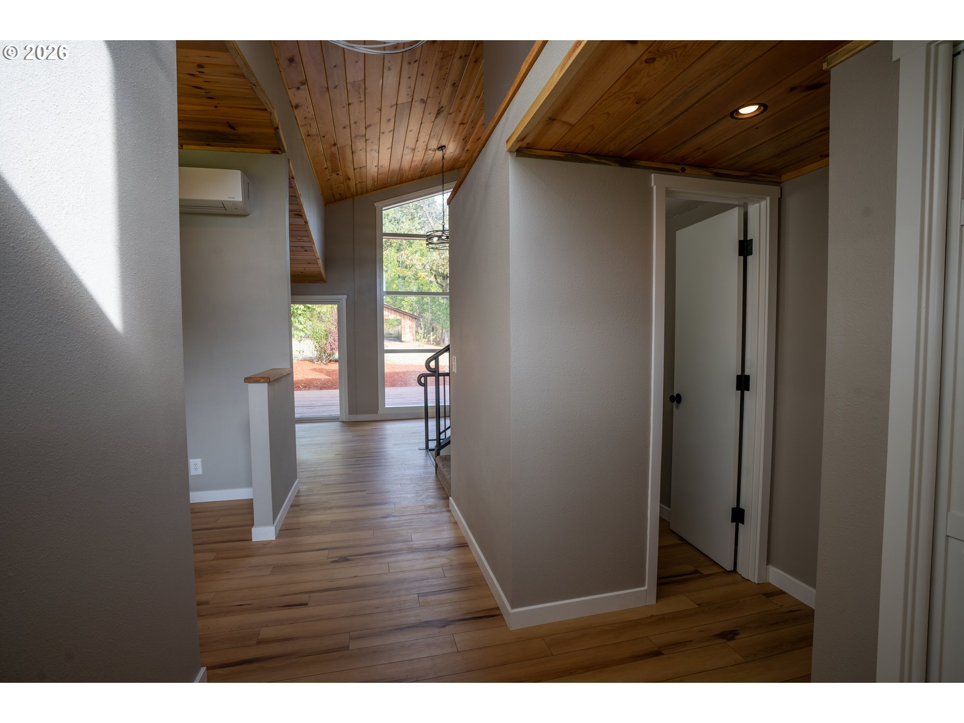 37075 Camp Creek Road Springfield, OR 97478 - Photo 7 of 48 a view of entryway with wooden floor