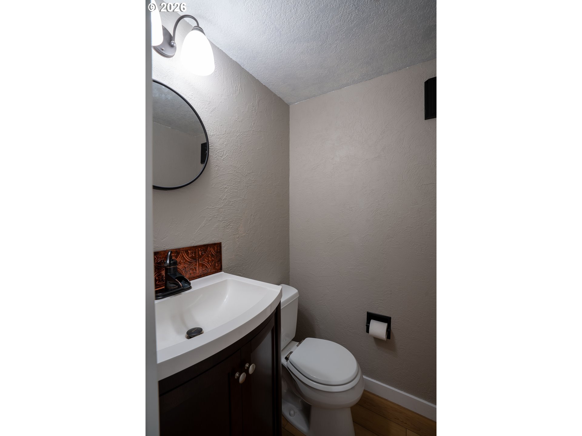 37075 Camp Creek Road Springfield, OR 97478 - Photo 8 of 48 a bathroom with a toilet and a sink