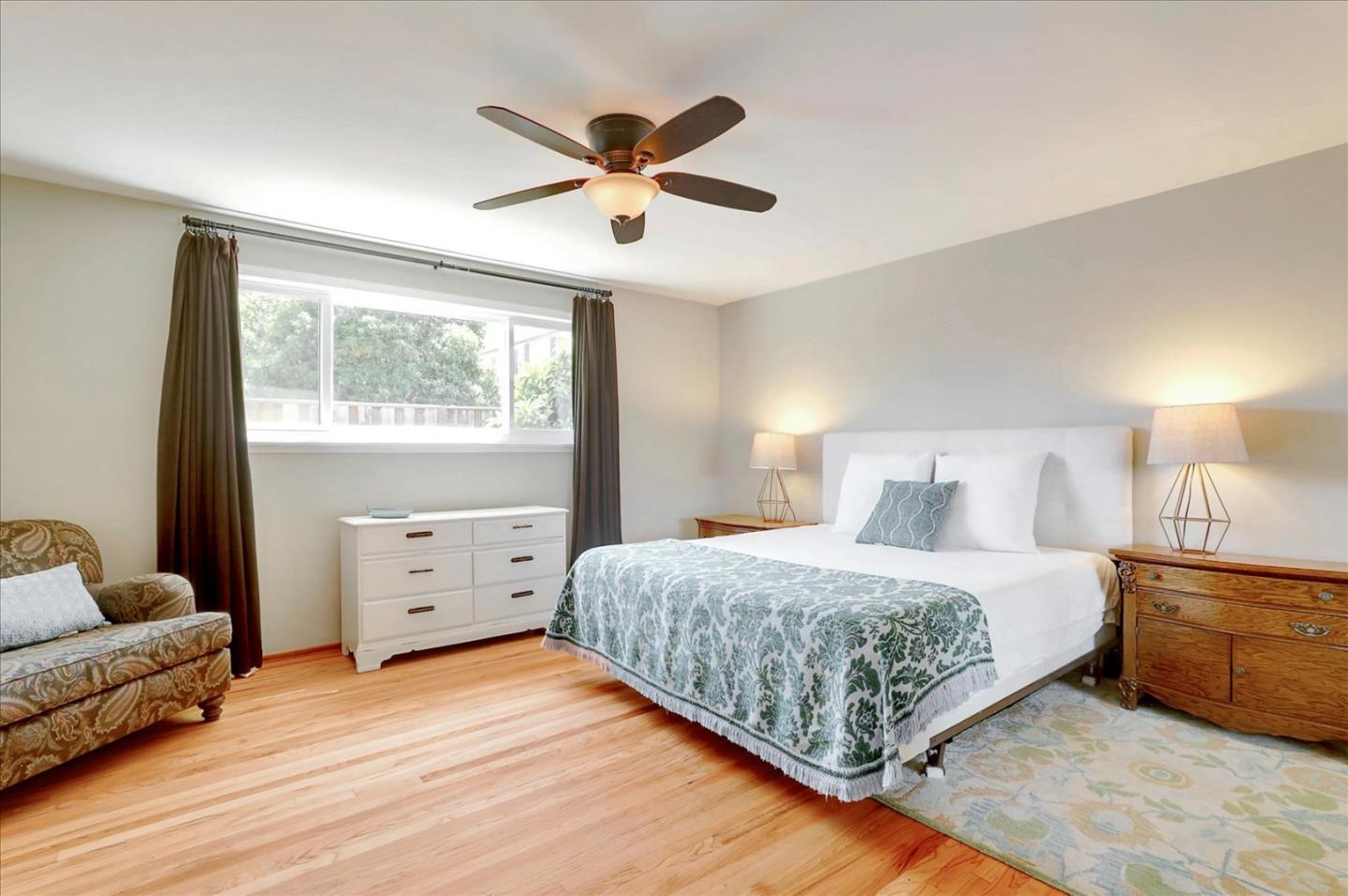 970 Stonehurst Way Campbell, CA 95008 - Photo 15 of 21 a bedroom with a bed and window