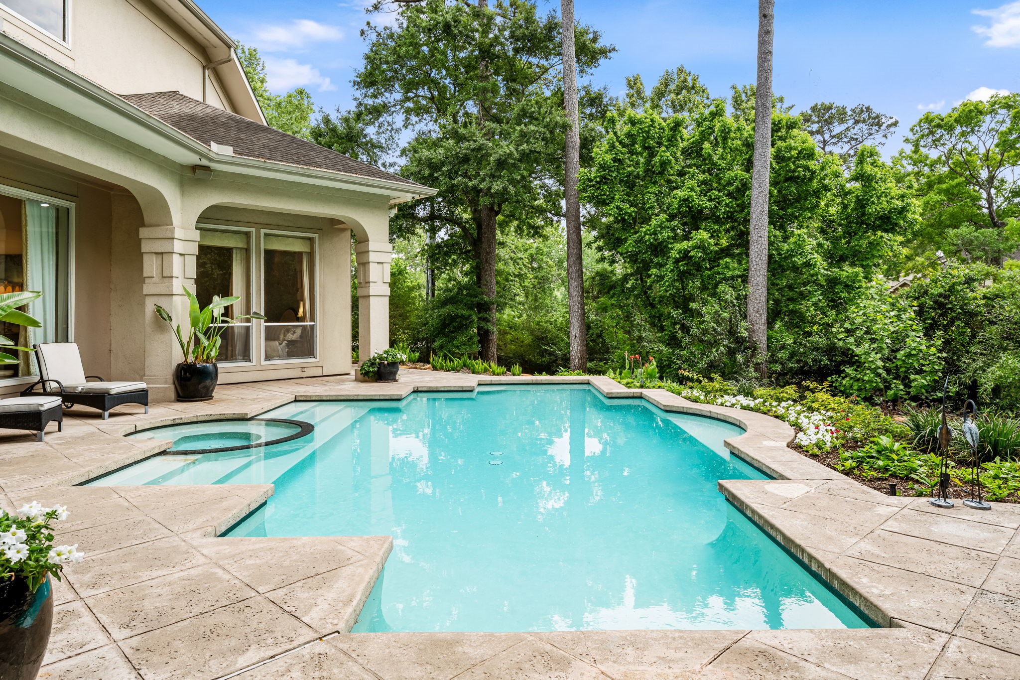 6 Mott Lane Houston, TX 77024 - Photo 45 of 50 Resort-style pool and spa surrounded by lush, mature landscaping for ultimate privacy.
