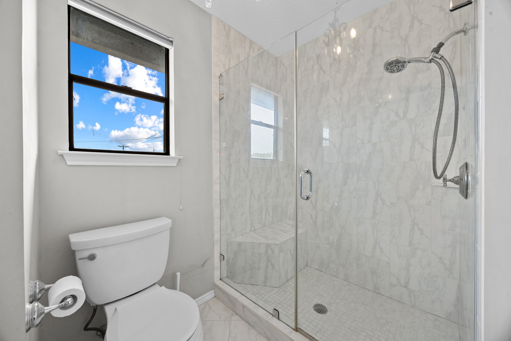 1000 West Noton Street Pflugerville, TX 78660 - Photo 24 of 35 a bathroom with a shower a toilet and a shower