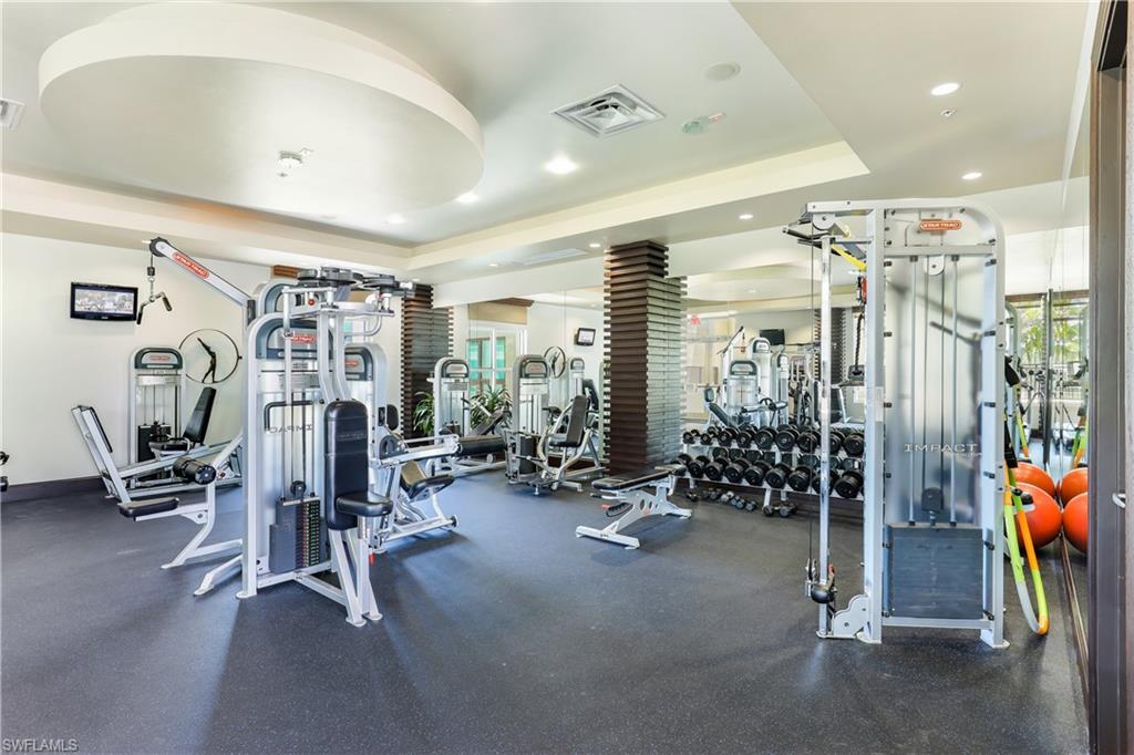 9123 Strada Place, Unit 7404 Naples, FL 34108 - Photo 28 of 36 a view of a room with gym equipment