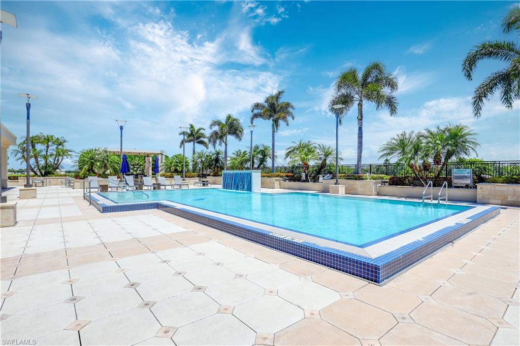 9123 Strada Place, Unit 7404 Naples, FL 34108 - Photo 35 of 36 a view of an outdoor space and swimming pool