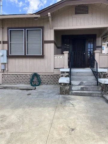 a view of entrance gate of the house
