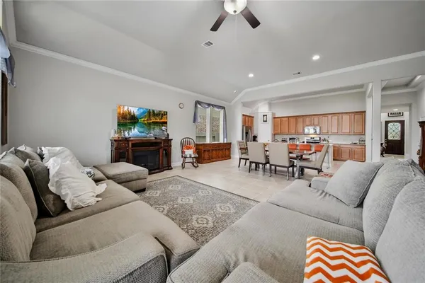 a living room with furniture and a couch