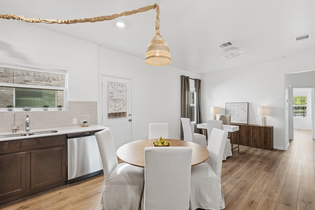 1233 Sweetspire Street Leander, TX 78641 - Photo 6 of 40 Attached private guest suite with separate entrance, living area, kitchenette, private bedroom and full bath and dedicated laundry facilities.