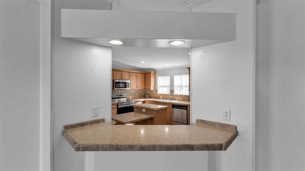 7549 Sinkhole Road Bartow, FL 33830 - Photo 22 of 40 a view of kitchen island with granite countertop lots of counter top space