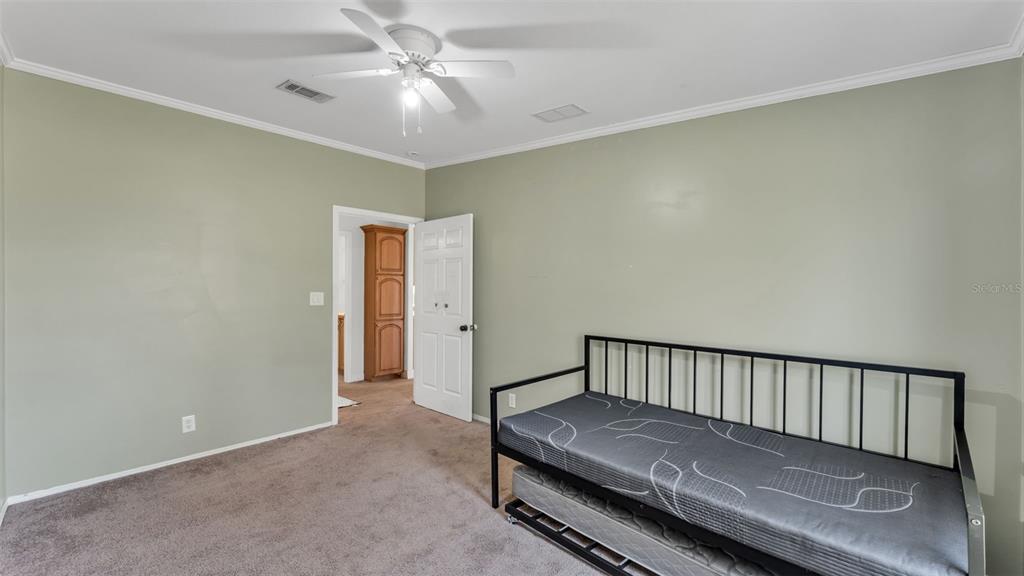 7549 Sinkhole Road Bartow, FL 33830 - Photo 30 of 40 a view of a hallway with a bedroom