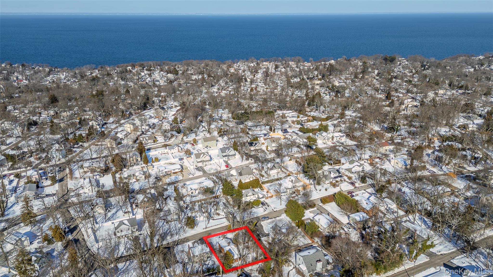 40 Hawthorne Road Rocky Point, NY 11778 - Photo 14 of 16 a view of a large building with wooden fence