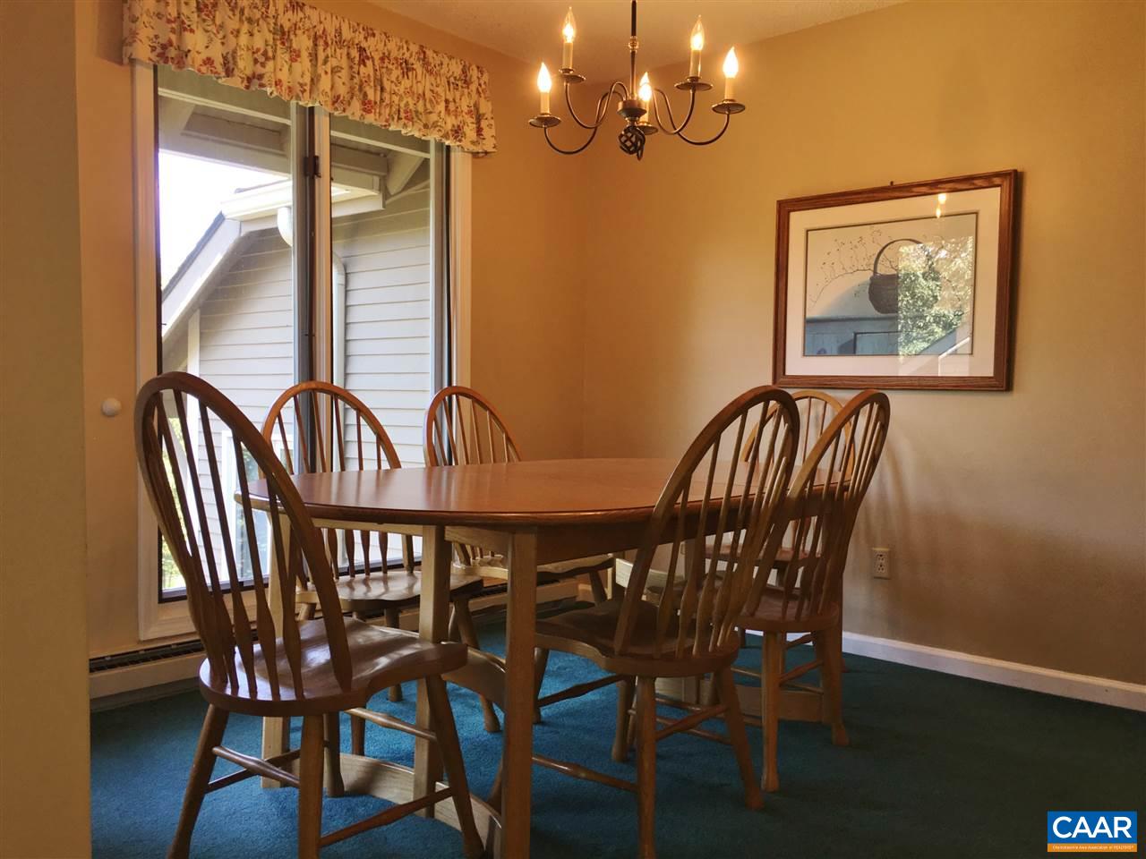 2033 Stone Ridge Roseland, VA 22967 - Photo 8 of 35 a view of a dining room that has a table and chairs