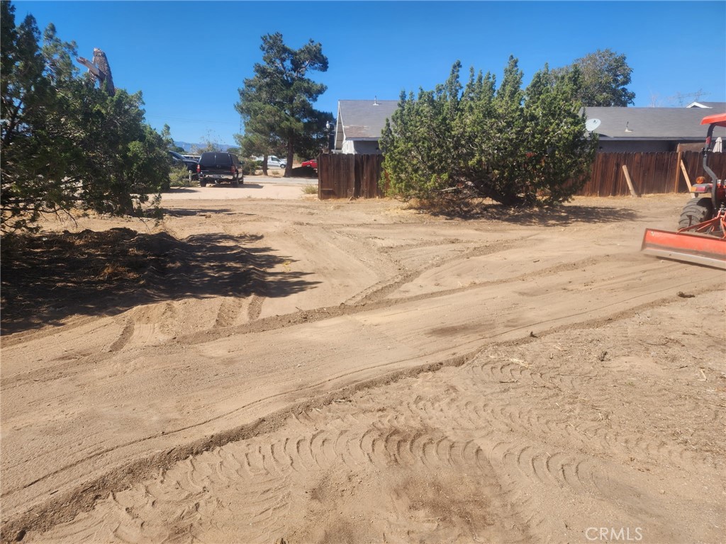 0 Spruce Street Hesperia, CA 92345 - Photo 2 of 5 a view of a yard with a house