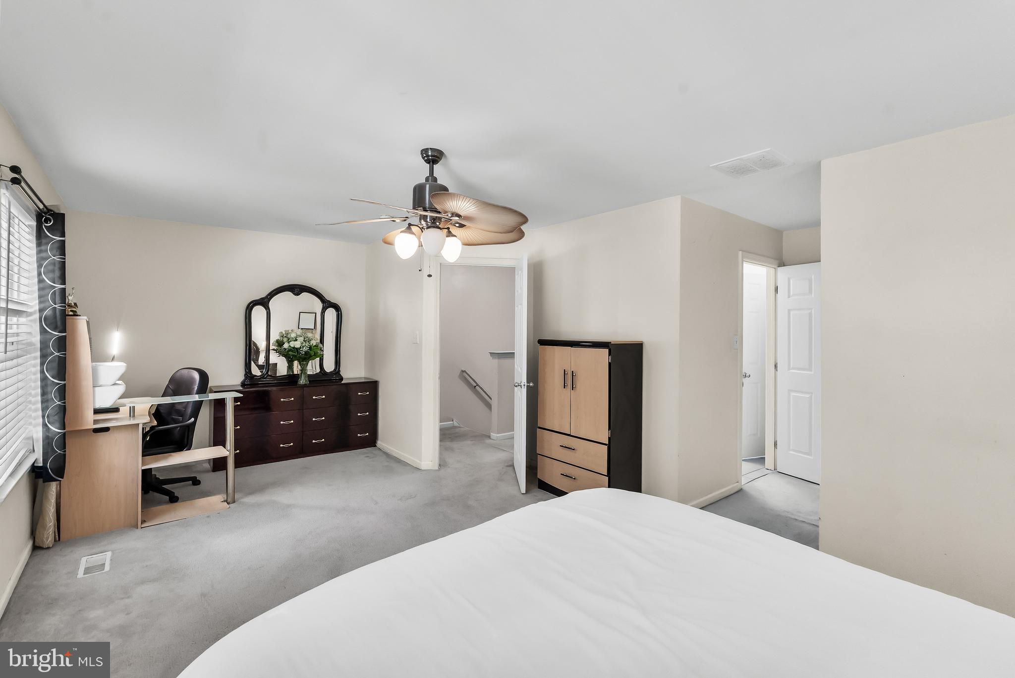 18 High Meadows Drive Sicklerville, NJ 08081 - Photo 19 of 25 a living room with furniture a chandelier and kitchen view