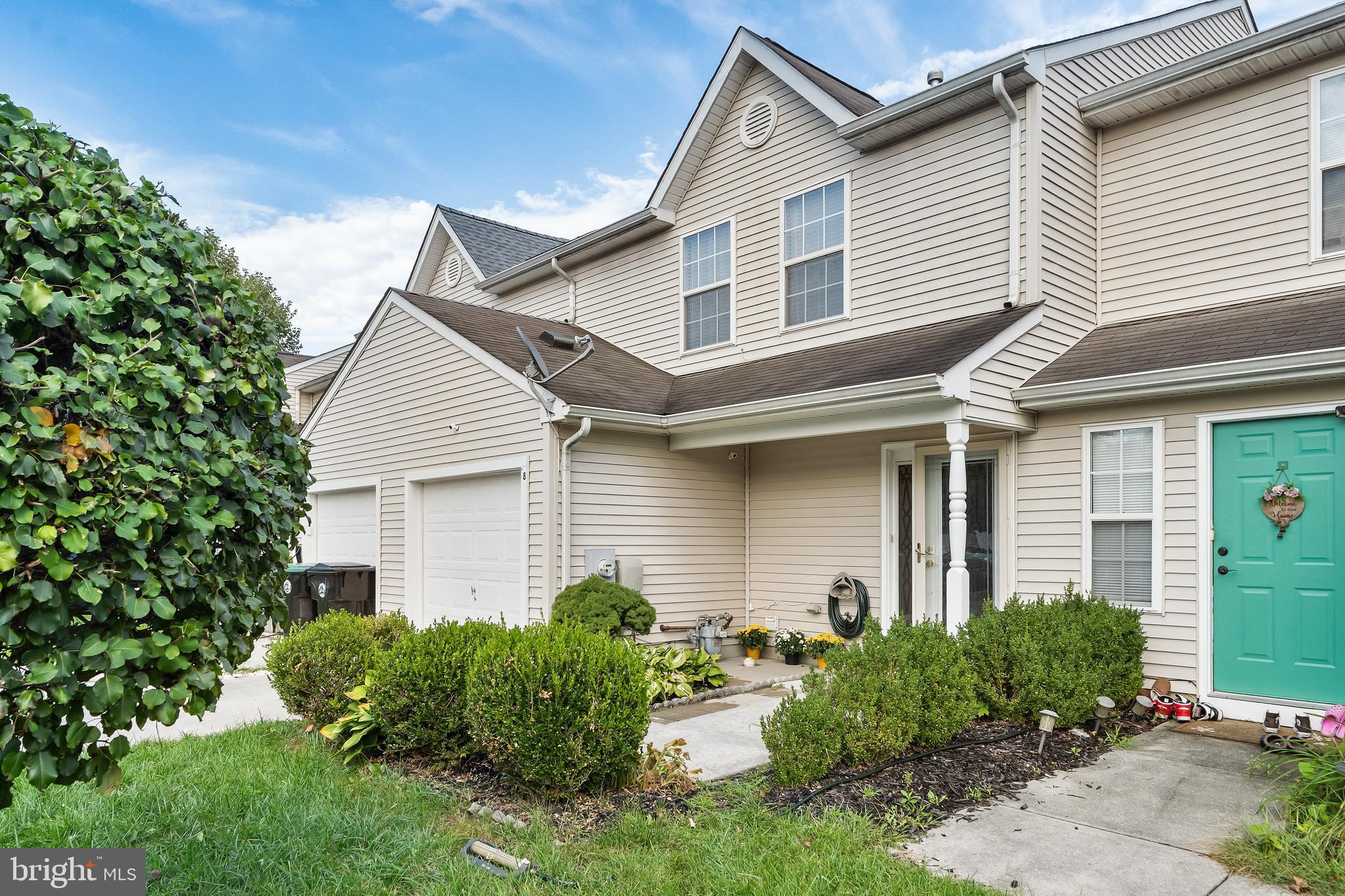 18 High Meadows Drive Sicklerville, NJ 08081 - Photo 2 of 25 a front view of a house with garden