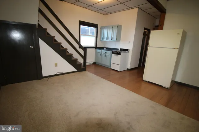 a view of hallway with washer and dryer