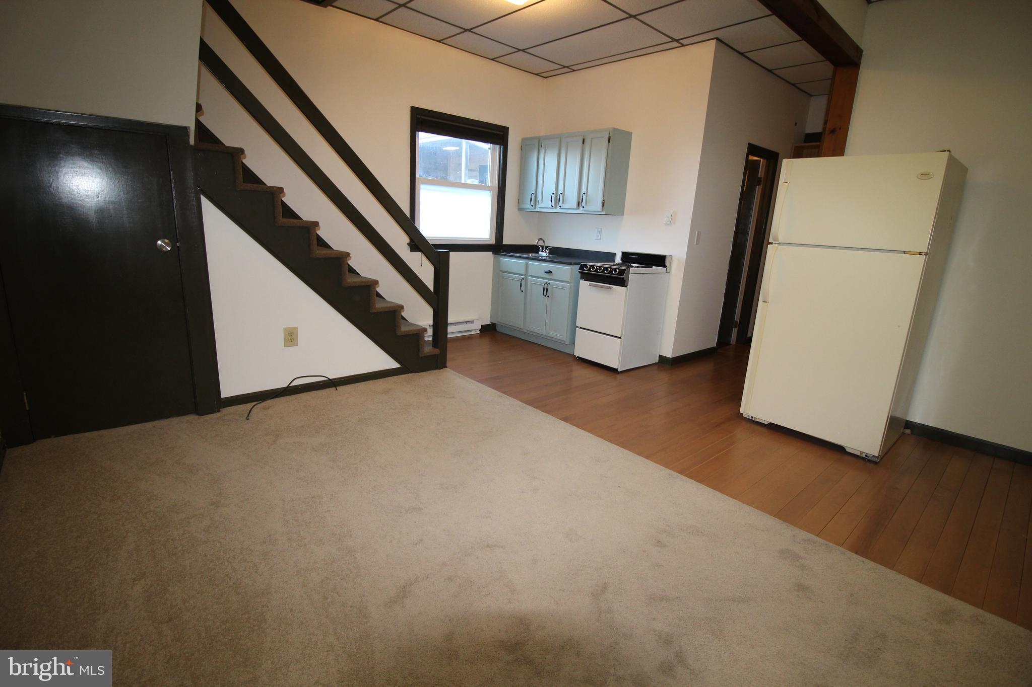 145 East A E Main Street New Holland, PA 17557 - Photo 3 of 9 a view of hallway with washer and dryer