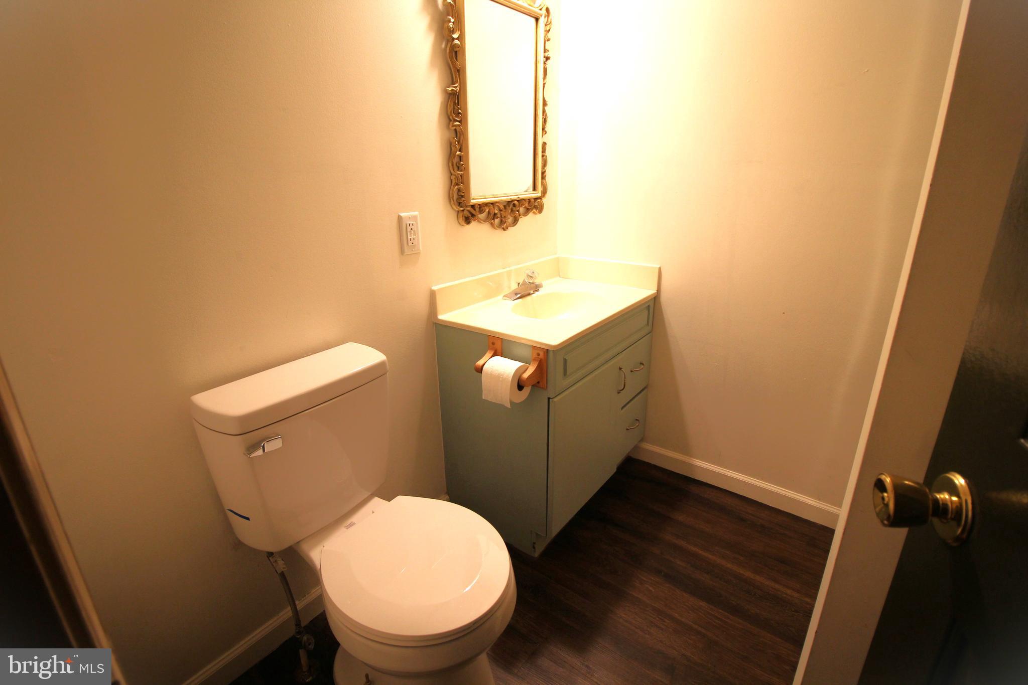 145 East A E Main Street New Holland, PA 17557 - Photo 9 of 9 a bathroom with a sink toilet and mirror