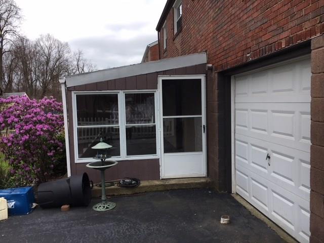 421 East Garden Road Pittsburgh, PA 15227 - Photo 22 of 23 Screened in patio in the rear.