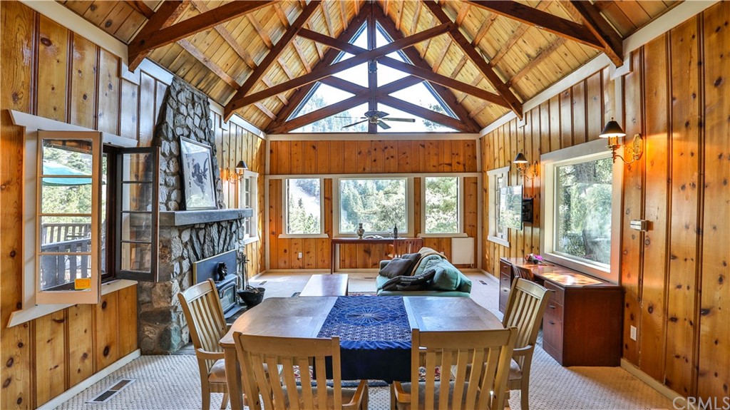 35 Manker Flats Mt Baldy, CA 91759 - Photo 12 of 48 a view of a dining room with furniture large windows and wooden floor