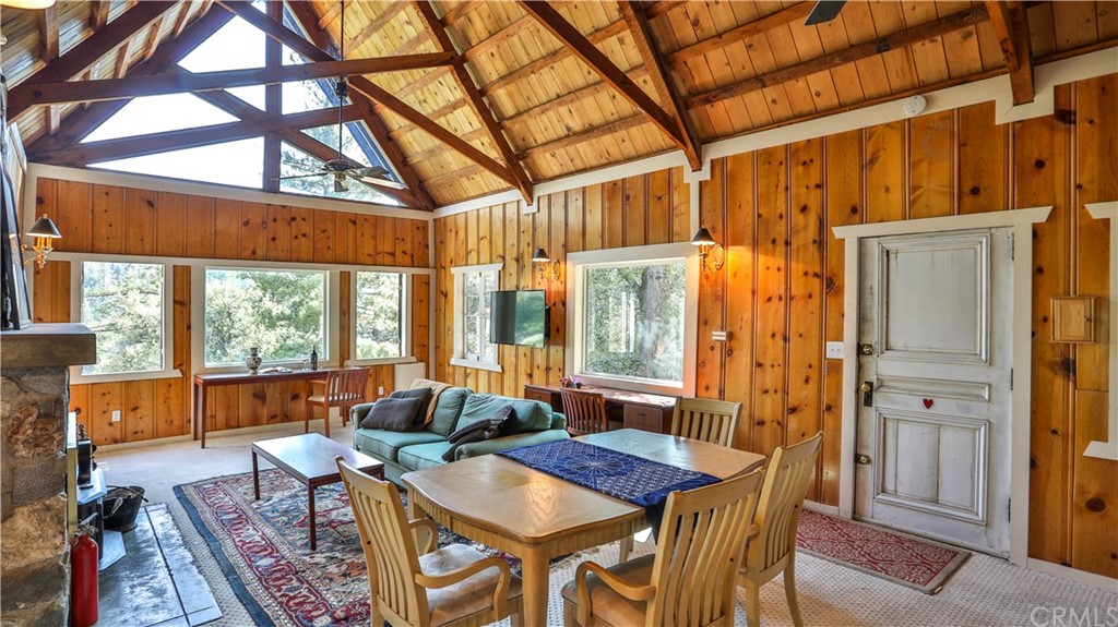 35 Manker Flats Mt Baldy, CA 91759 - Photo 13 of 48 a dining room with furniture and large windows