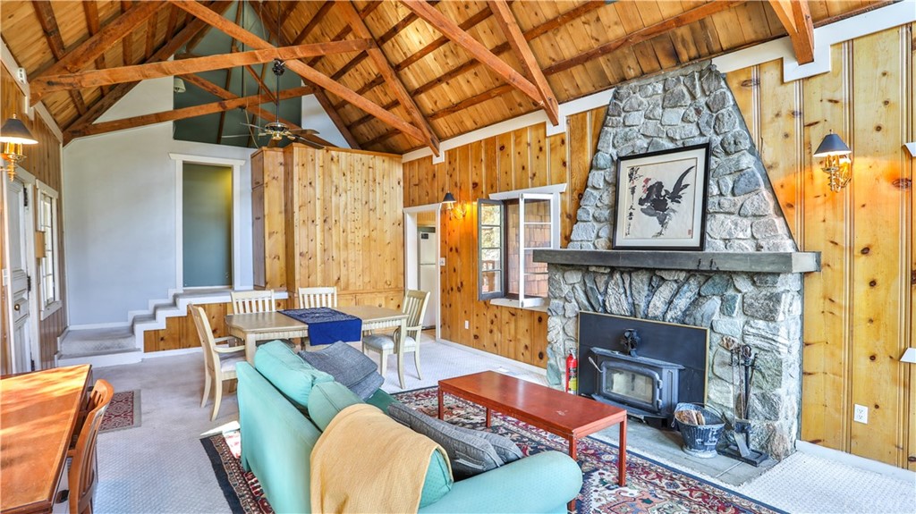 35 Manker Flats Mt Baldy, CA 91759 - Photo 16 of 48 a living room with furniture a fireplace and a table