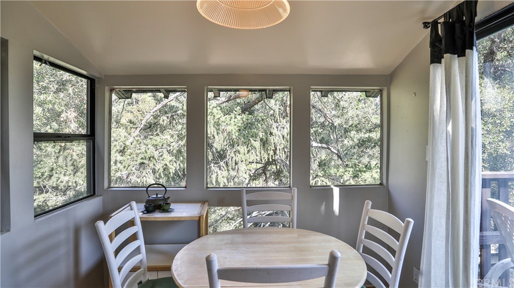 35 Manker Flats Mt Baldy, CA 91759 - Photo 23 of 48 a living room with furniture and a window