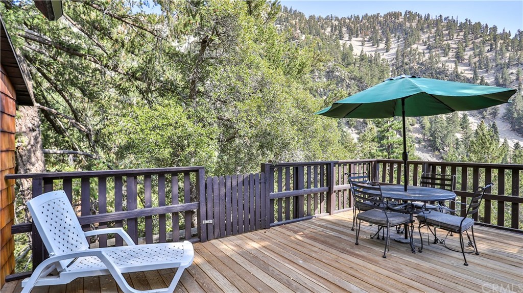 35 Manker Flats Mt Baldy, CA 91759 - Photo 26 of 48 a view of a chairs and table on the wooden floor