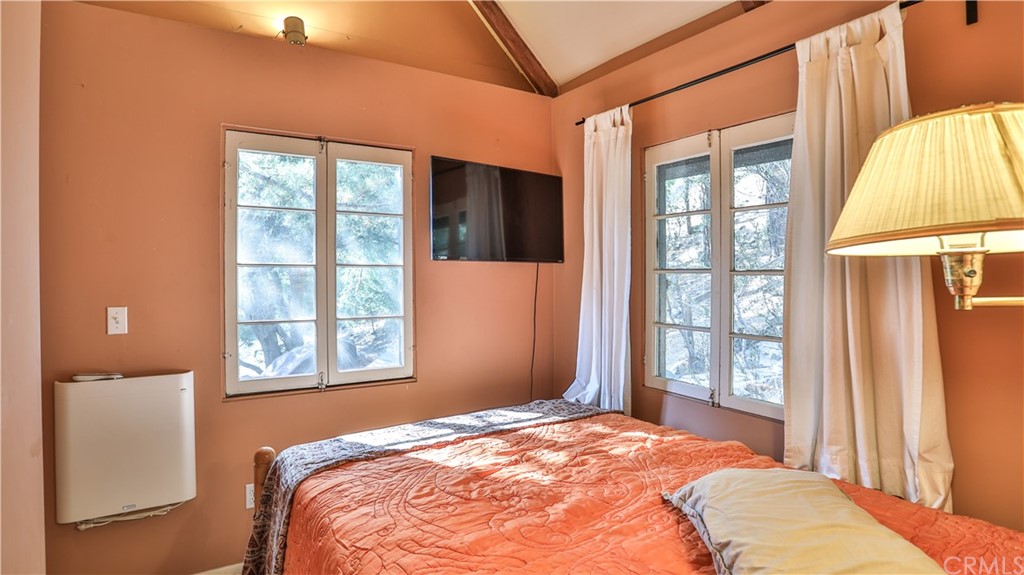 35 Manker Flats Mt Baldy, CA 91759 - Photo 31 of 48 a bedroom with a bed and a window