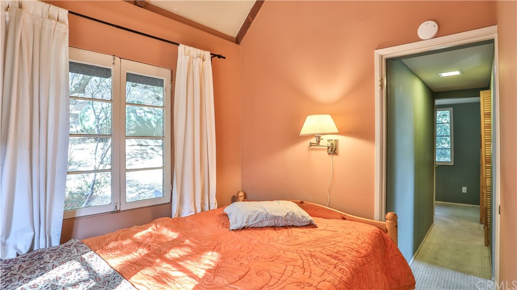 35 Manker Flats Mt Baldy, CA 91759 - Photo 32 of 48 a bedroom with a bed and window