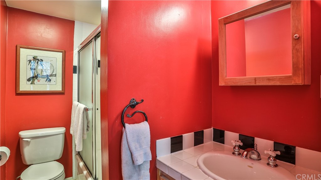 35 Manker Flats Mt Baldy, CA 91759 - Photo 35 of 48 a bathroom with a toilet sink and mirror