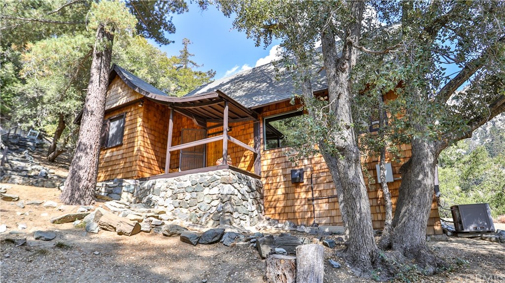 35 Manker Flats Mt Baldy, CA 91759 - Photo 4 of 48 front view of a house with a large tree