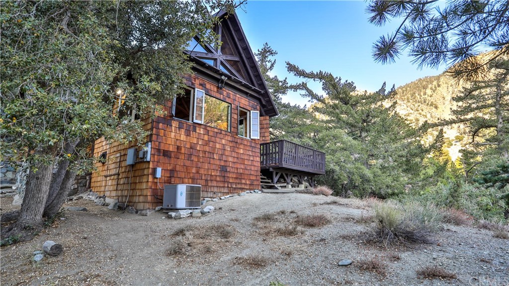 35 Manker Flats Mt Baldy, CA 91759 - Photo 6 of 48 a view of a house with a yard and garage
