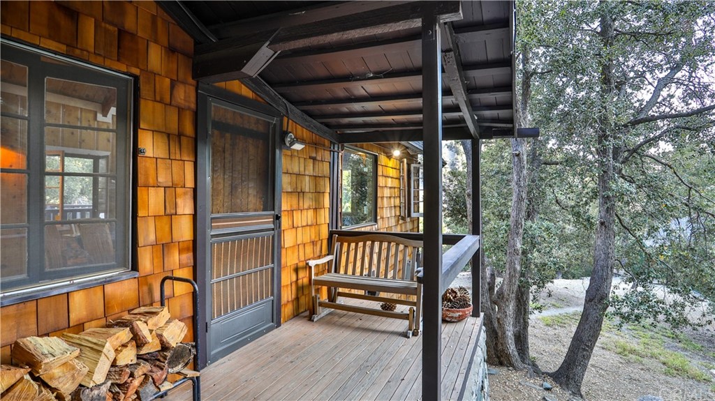 35 Manker Flats Mt Baldy, CA 91759 - Photo 8 of 48 a view of a porch with furniture and a gate