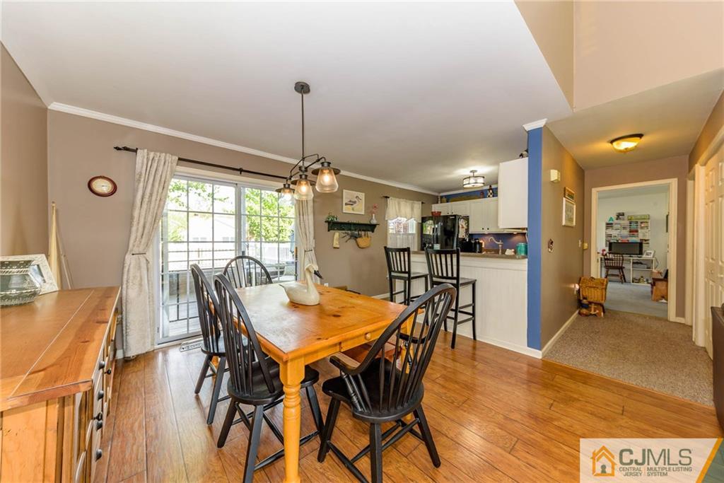 105 Quadrant Road Manahawkin, NJ 08050 - Photo 5 of 25 a view of a dining room with furniture